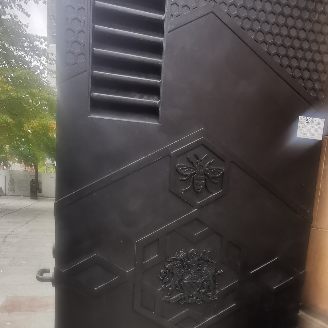 Bee on big black cabinet, Albert Square