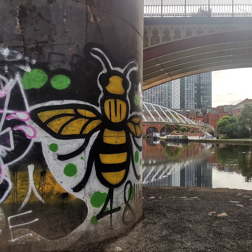 Grafiti bee on viaduct column, Castlefield